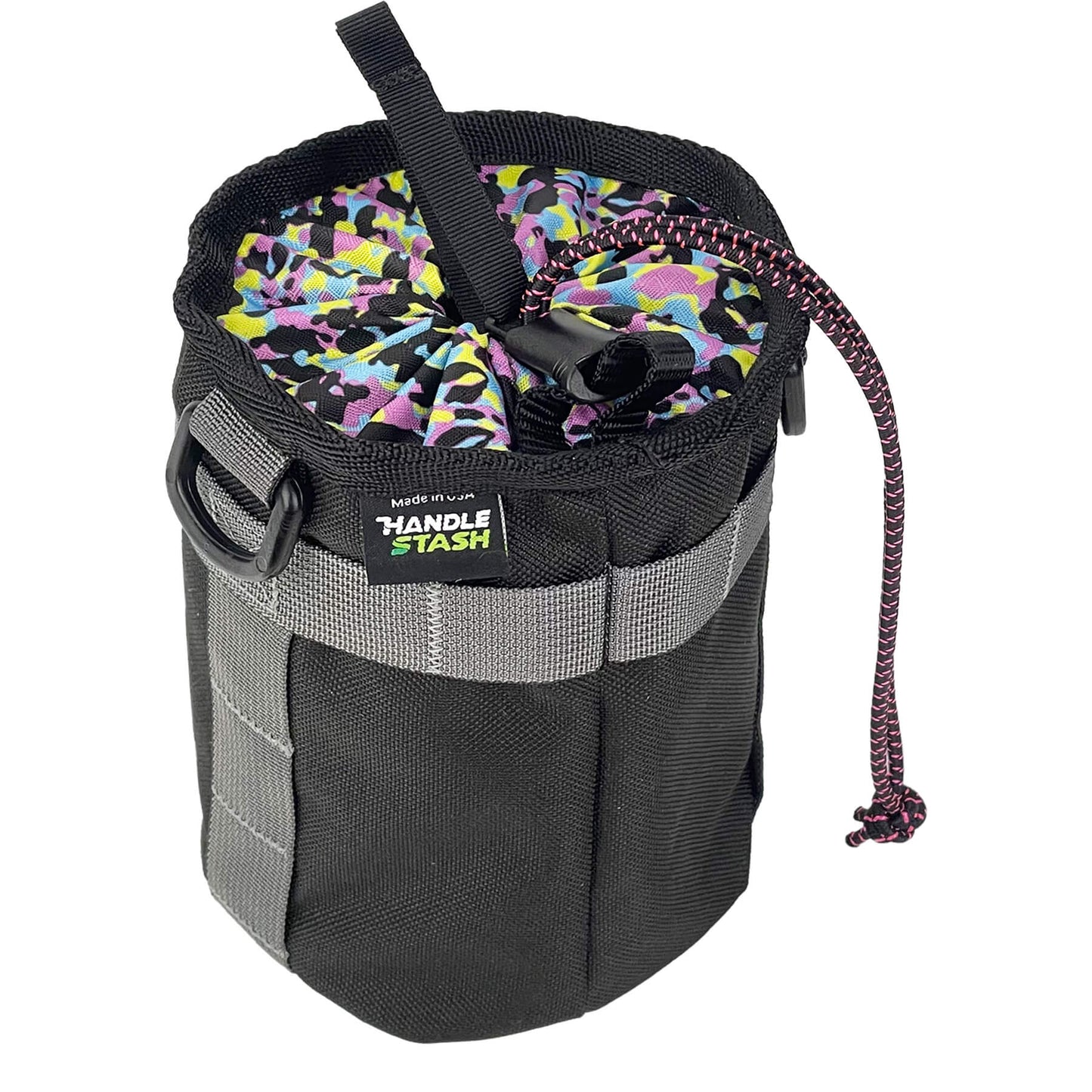 Black stem bag with neon camo liner cinched closed.