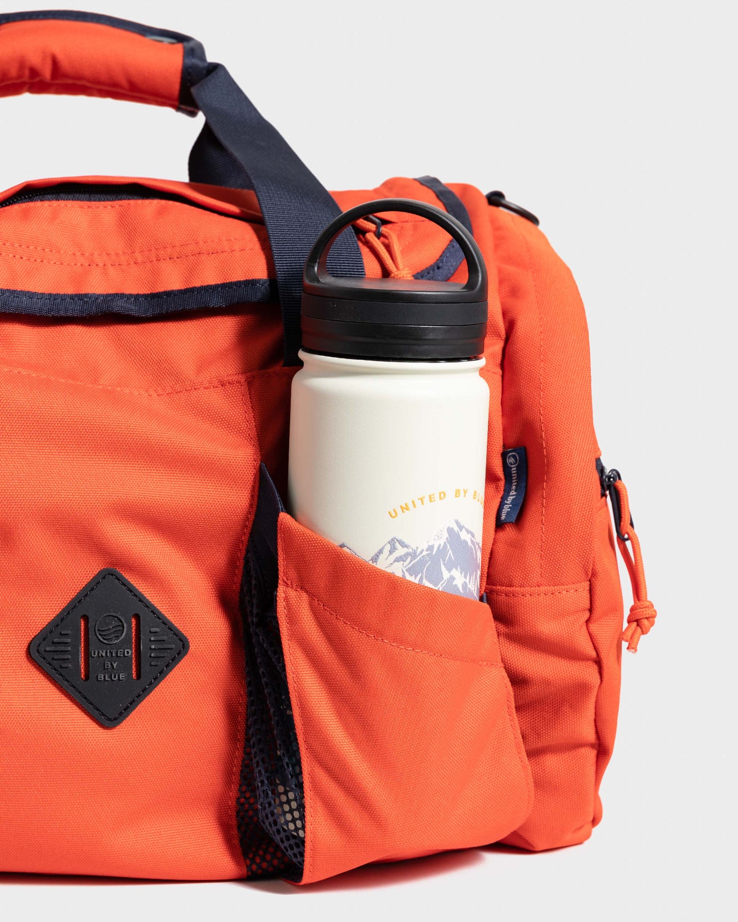 (R)evolution™ 27L Mini Duffle - Cardinal, Lakeside Camo